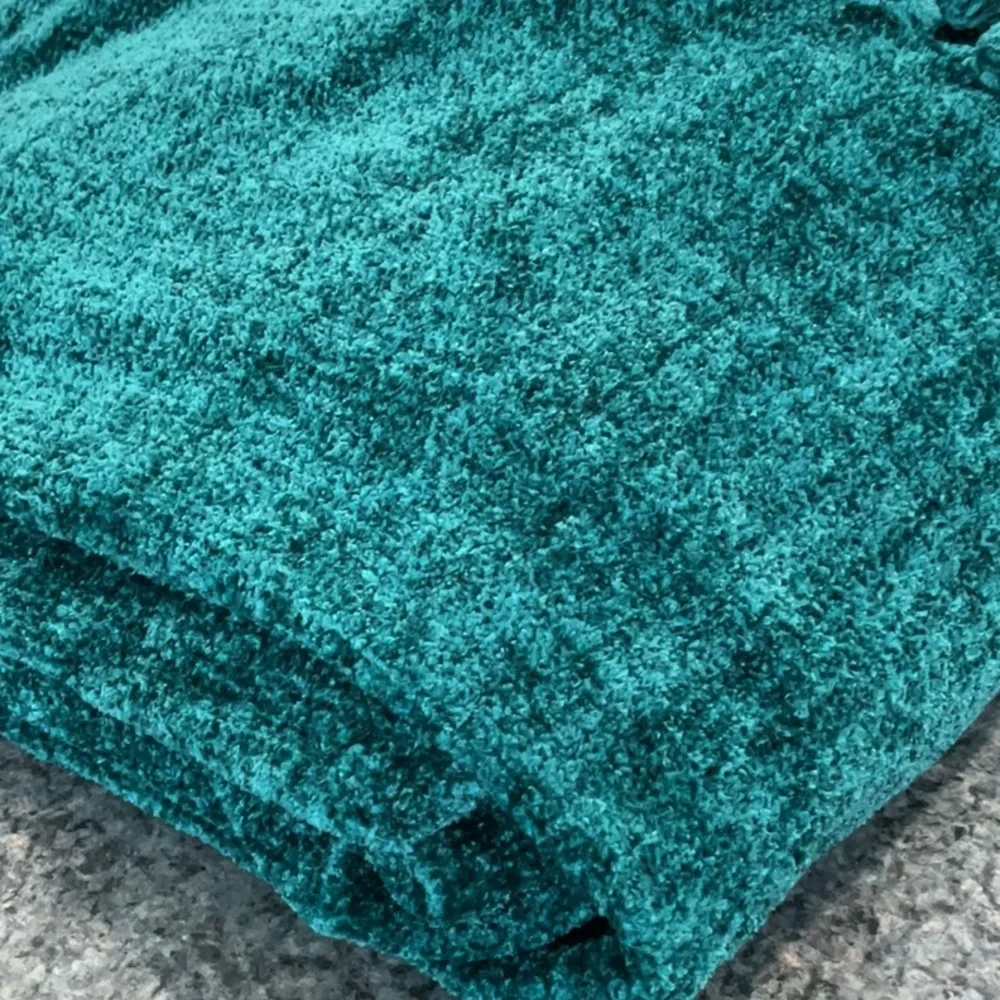 Pier 1 Imports fringed throw.